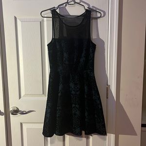 Blue and black lace mini dress with a mesh top